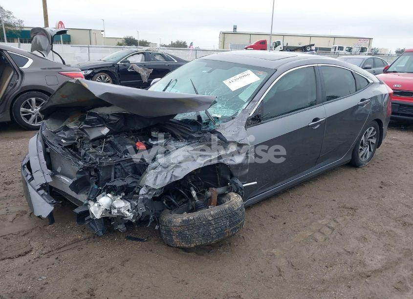 Photo 2 of 2017 Honda Civic EX (VIN 19XFC2F77HE004860)