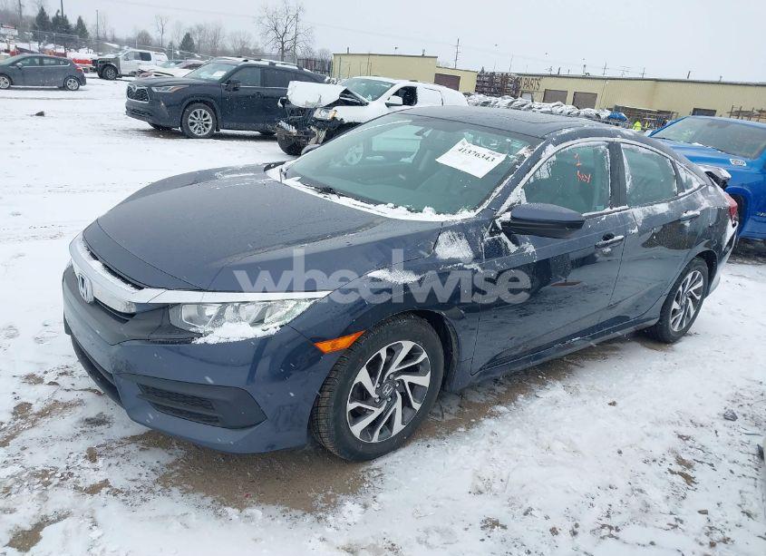 Photo 2 of 2018 Honda Civic EX (VIN 19XFC2F77JE024905)