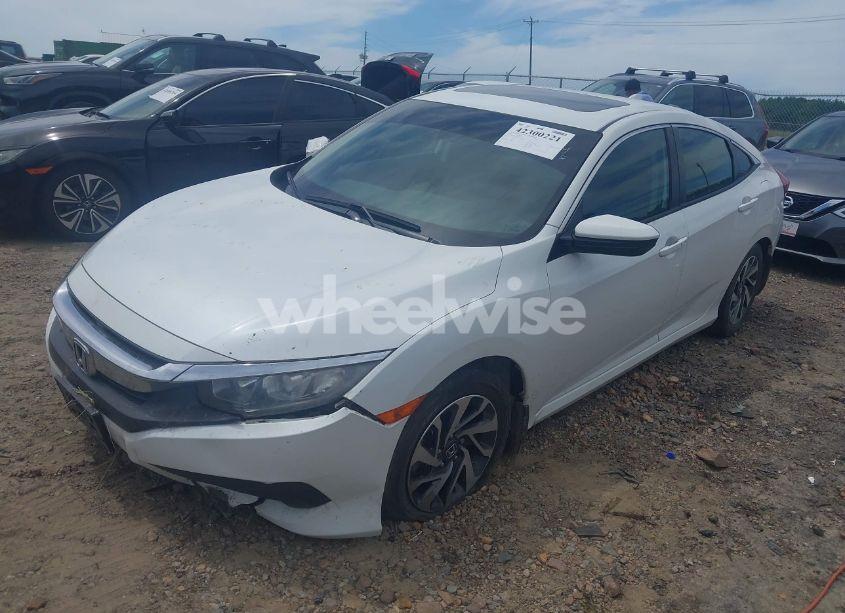 Photo 2 of 2018 Honda Civic EX (VIN 19XFC2F77JE039114)