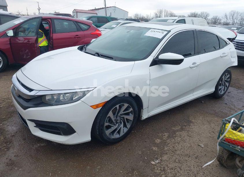 Photo 2 of 2018 Honda Civic EX (VIN 19XFC2F78JE038859)