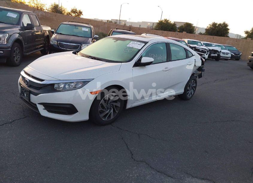 Photo 2 of 2018 Honda Civic EX (VIN 19XFC2F78JE207570)