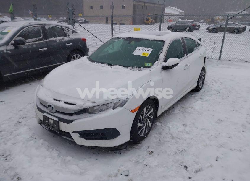 Photo 2 of 2017 Honda Civic EX (VIN 19XFC2F79HE040520)
