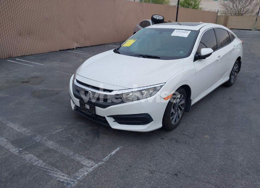 Photo 2 of 2017 Honda Civic EX (VIN 19XFC2F79HE205515)