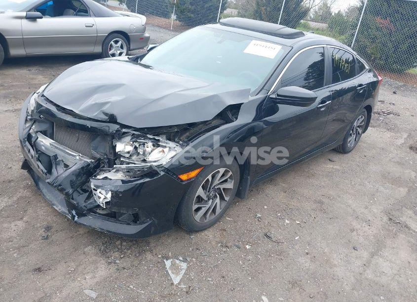 Photo 2 of 2018 Honda Civic EX (VIN 19XFC2F79JE000699)
