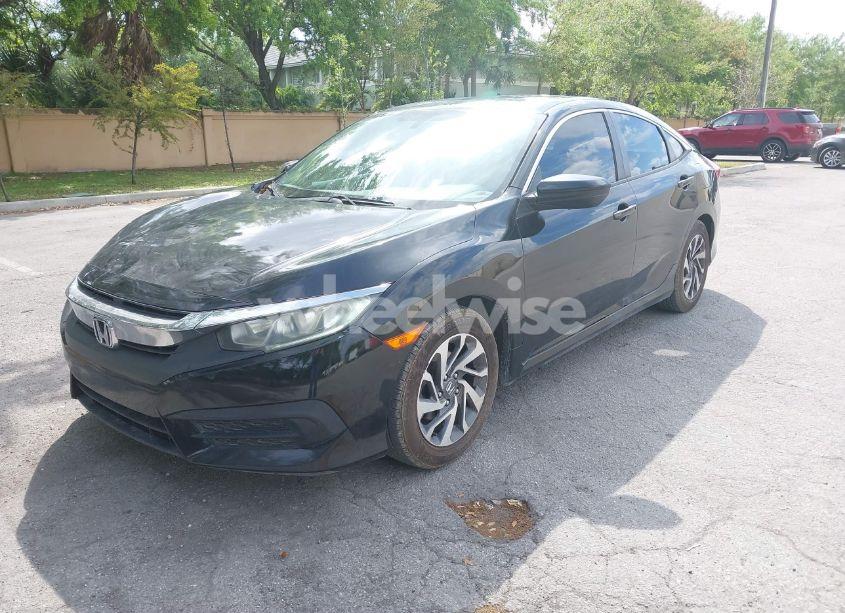 Photo 2 of 2018 Honda Civic EX (VIN 19XFC2F79JE020192)