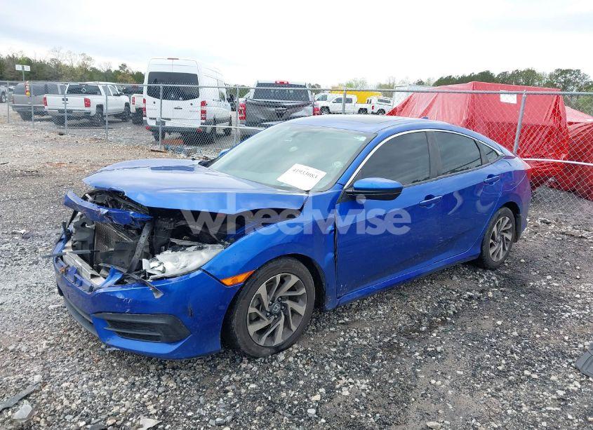 Photo 2 of 2018 Honda Civic EX (VIN 19XFC2F7XJE026552)