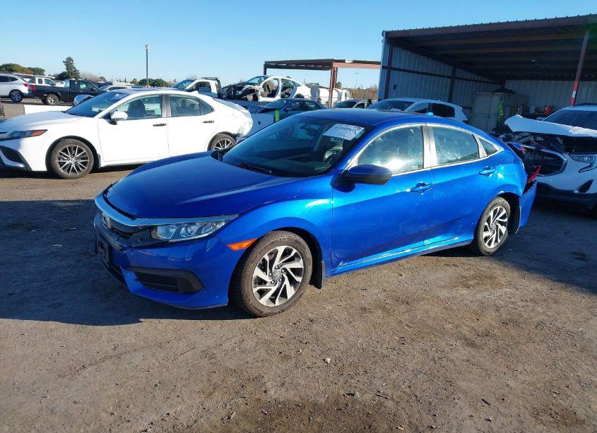 Photo 2 of 2018 Honda Civic EX (VIN 19XFC2F7XJE039060)