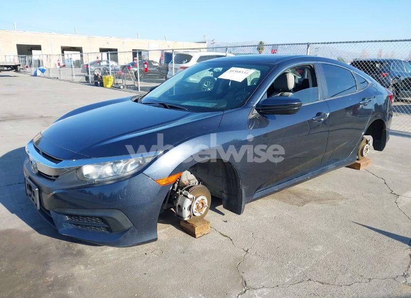 Photo 2 of 2018 Honda Civic EX (VIN 19XFC2F7XJE040533)
