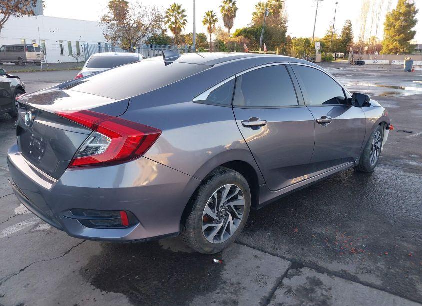 Photo 4 of 2018 Honda Civic EX (VIN 19XFC2F84JE200902)