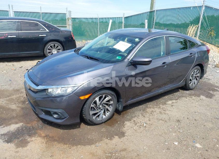 Photo 2 of 2017 Honda Civic EX (VIN 19XFC2F86HE211572)