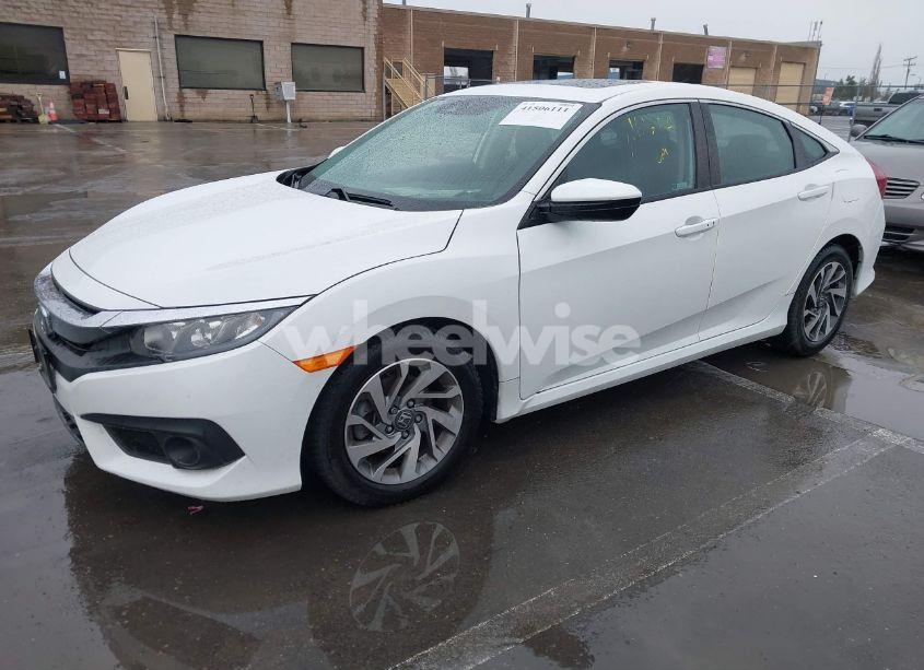 Photo 2 of 2018 Honda Civic EX (VIN 19XFC2F86JE201288)