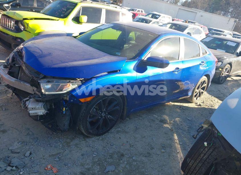 Photo 2 of 2019 Honda Civic SPORT (VIN 19XFC2F8XKE010149)