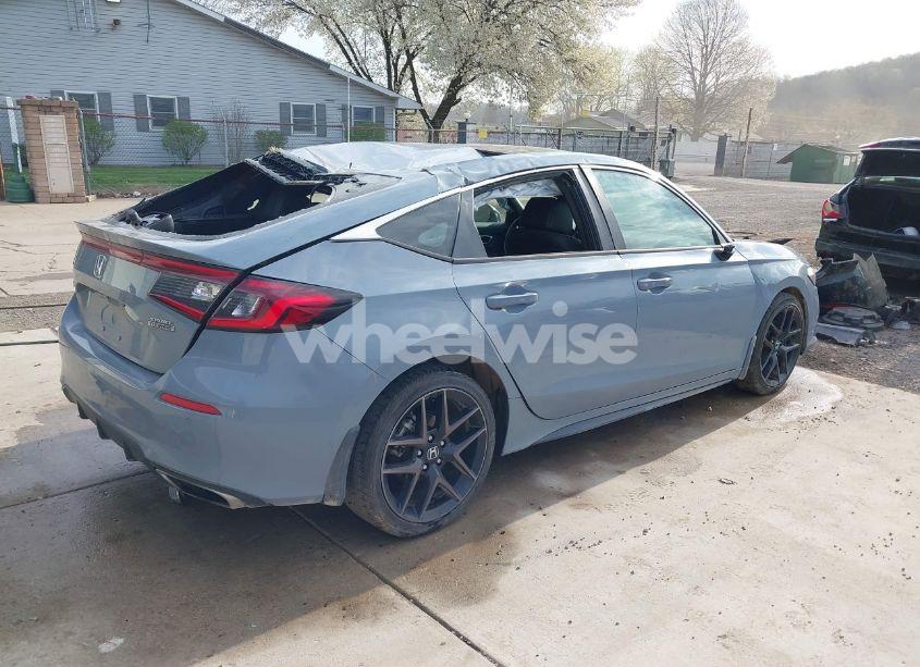 Photo 4 of 2024 Honda Civic SPORT TOURING (VIN 19XFL1G85RE004486)