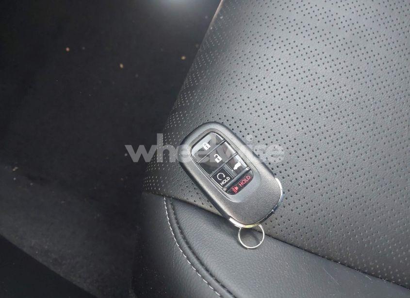 Photo 11 of 2024 Honda Civic EX-L (VIN 19XFL1H77RE004141)