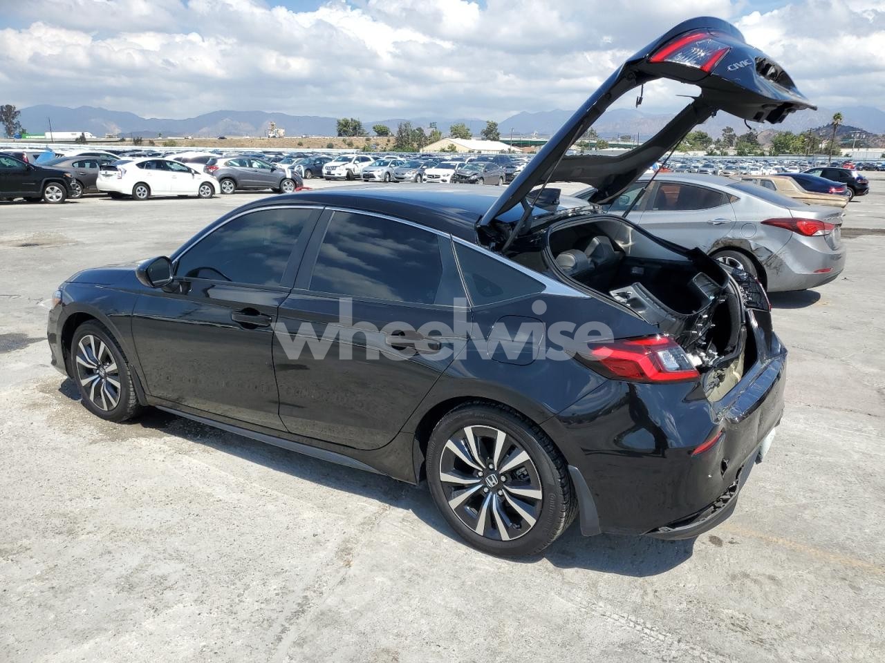 Photo 2 of 2024 HONDA CIVIC EXL (VIN 19XFL1H77RE008691)