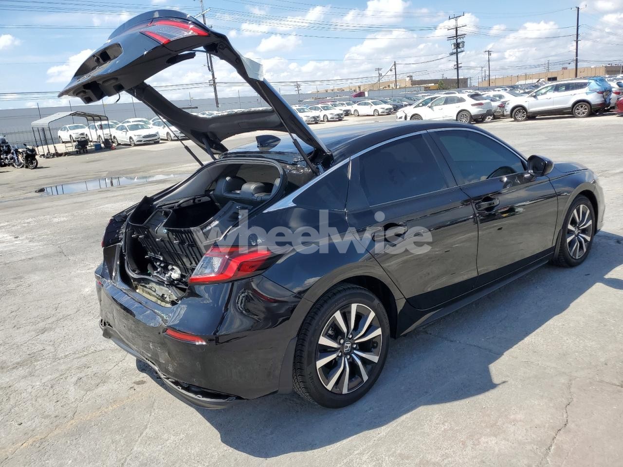 Photo 3 of 2024 HONDA CIVIC EXL (VIN 19XFL1H77RE008691)