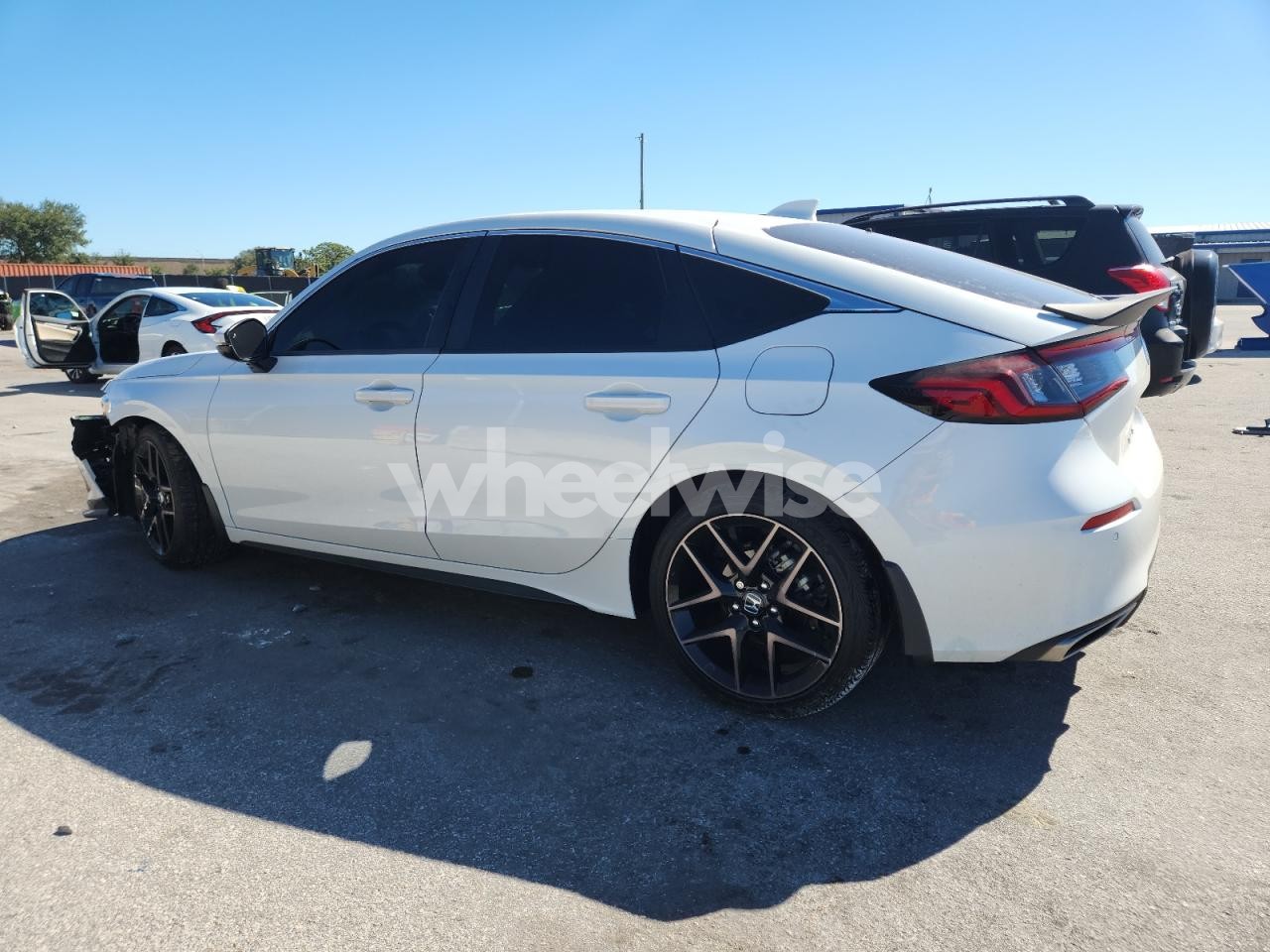 Photo 2 of 2023 HONDA CIVIC SPORT TOURING (VIN 19XFL1H80PE017917)