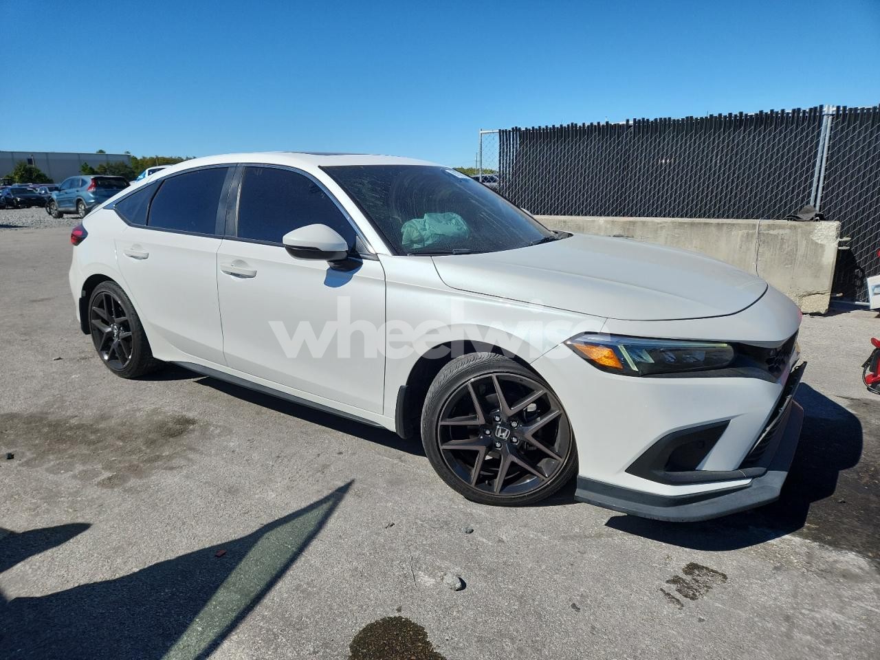 Photo 4 of 2023 HONDA CIVIC SPORT TOURING (VIN 19XFL1H80PE017917)