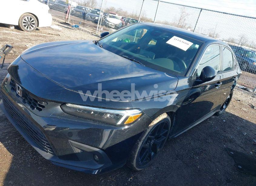 Photo 2 of 2024 Honda Civic SPORT TOURING (VIN 19XFL1H80RE003969)