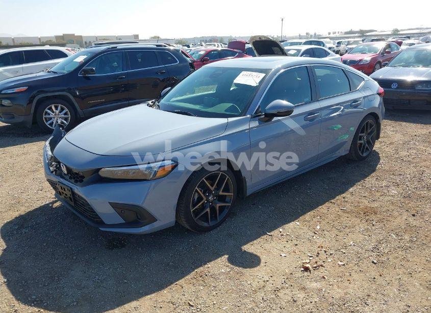 Photo 2 of 2024 Honda Civic SPORT TOURING (VIN 19XFL1H80RE009738)