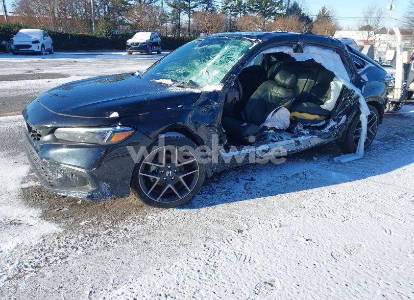 Photo 2 of 2024 Honda Civic SPORT TOURING (VIN 19XFL1H80RE013742)