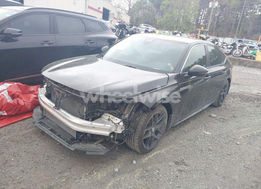 Photo 2 of 2024 Honda Civic SPORT TOURING (VIN 19XFL1H80RE023882)