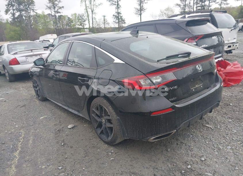 Photo 3 of 2024 Honda Civic SPORT TOURING (VIN 19XFL1H80RE023882)