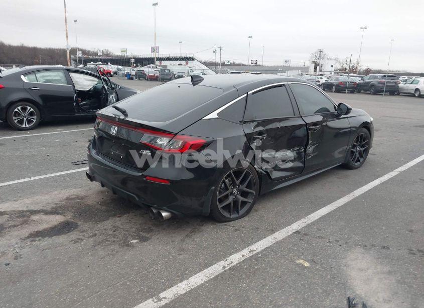 Photo 4 of 2024 Honda Civic SPORT TOURING (VIN 19XFL1H81RE007190)