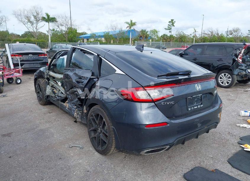 Photo 3 of 2024 Honda Civic SPORT TOURING (VIN 19XFL1H81RE024247)