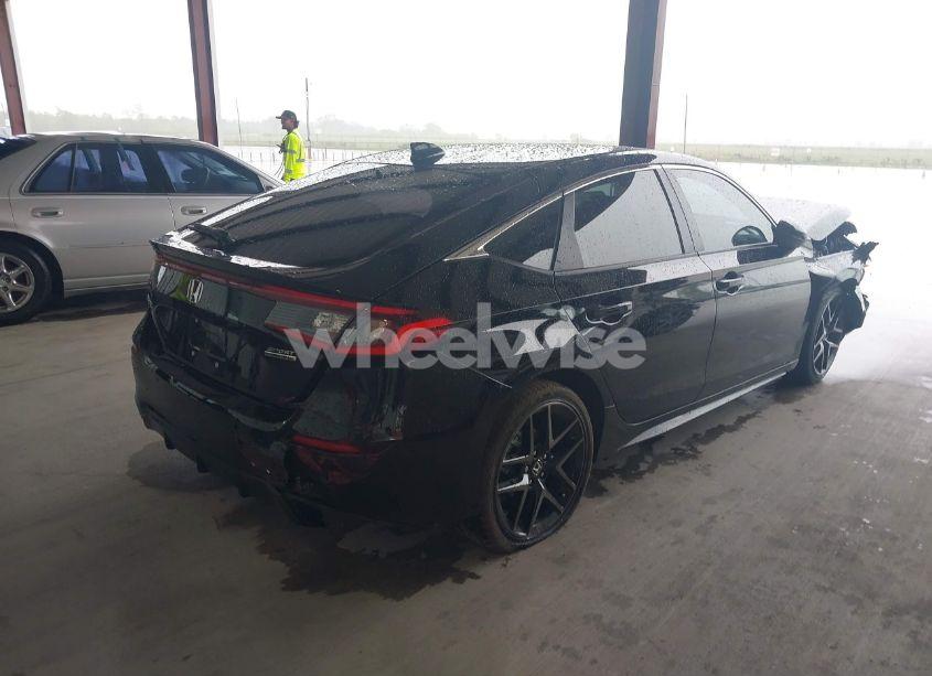 Photo 4 of 2024 Honda Civic SPORT TOURING (VIN 19XFL1H81RE029402)