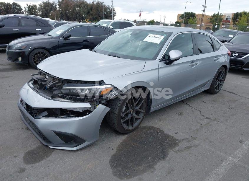 Photo 2 of 2024 Honda Civic SPORT TOURING (VIN 19XFL1H83RE017526)