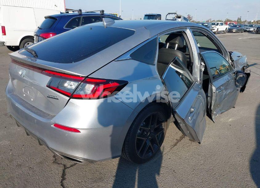 Photo 4 of 2024 Honda Civic SPORT TOURING (VIN 19XFL1H83RE017526)