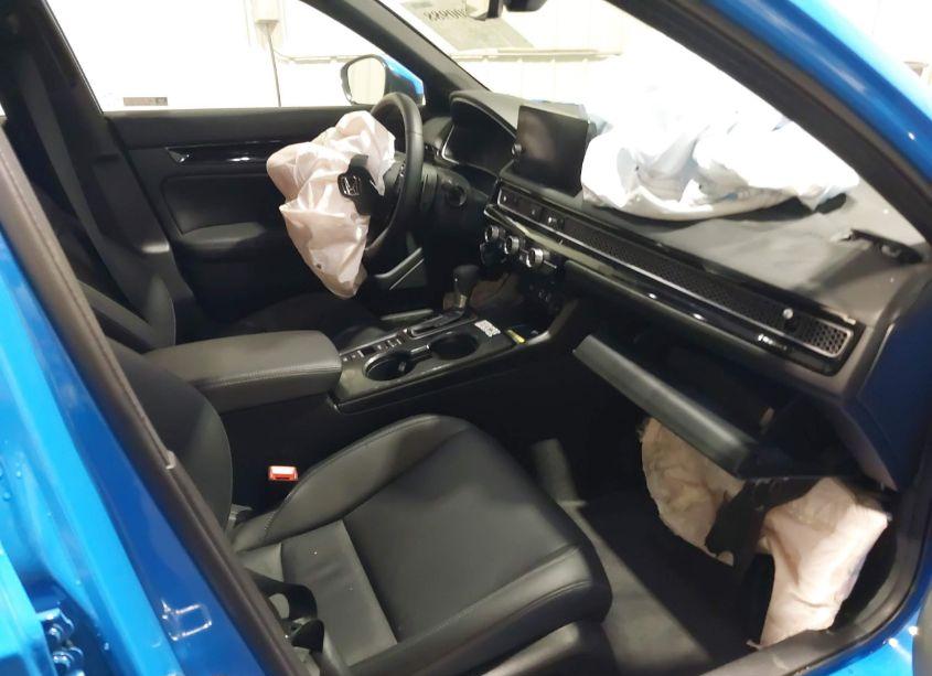 Photo 5 of 2024 Honda Civic SPORT TOURING (VIN 19XFL1H84RE009225)