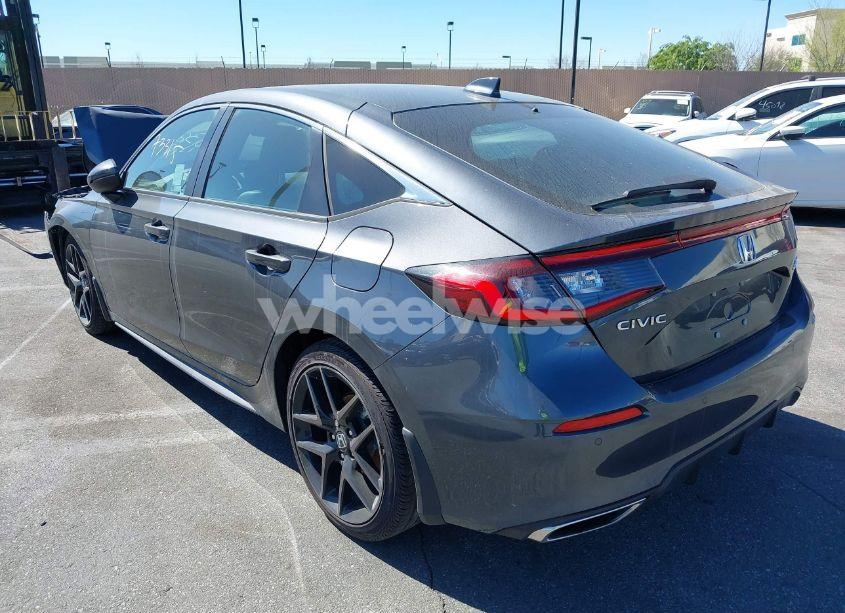 Photo 3 of 2024 Honda Civic SPORT TOURING (VIN 19XFL1H84RE011556)