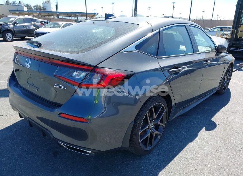 Photo 4 of 2024 Honda Civic SPORT TOURING (VIN 19XFL1H84RE011556)