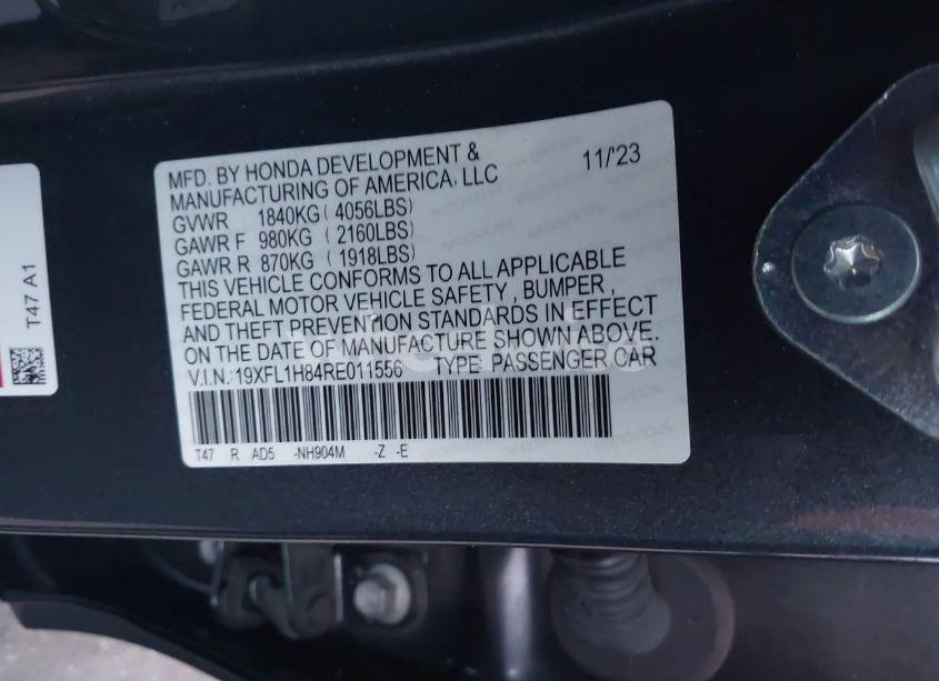 Photo 9 of 2024 Honda Civic SPORT TOURING (VIN 19XFL1H84RE011556)