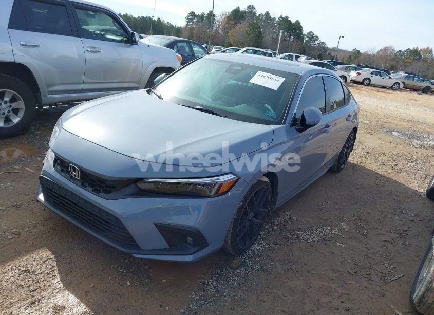 Photo 2 of 2024 Honda Civic SPORT TOURING (VIN 19XFL1H86RE003281)