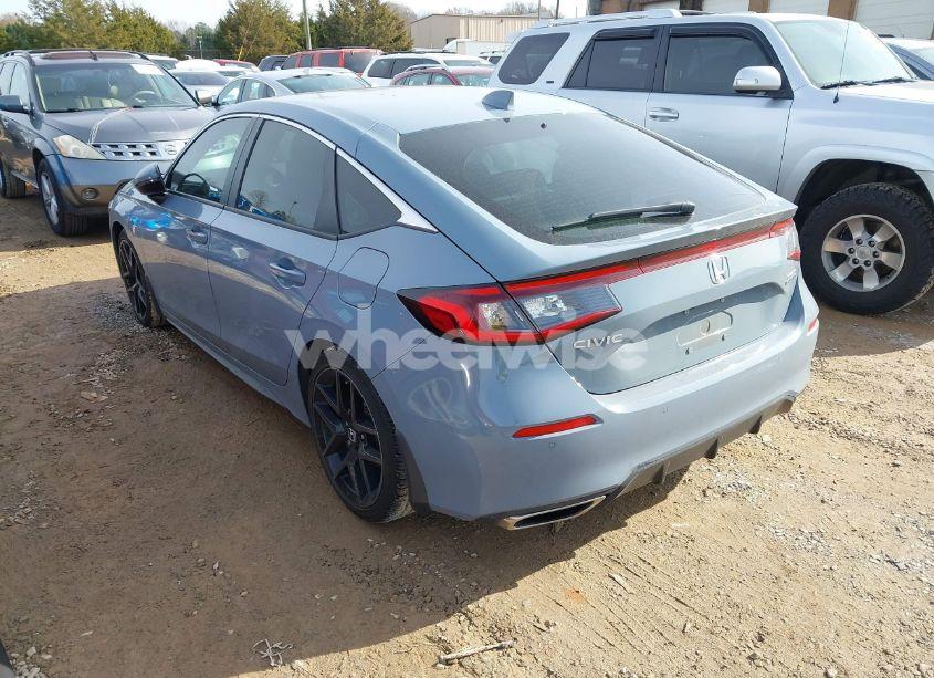 Photo 3 of 2024 Honda Civic SPORT TOURING (VIN 19XFL1H86RE003281)