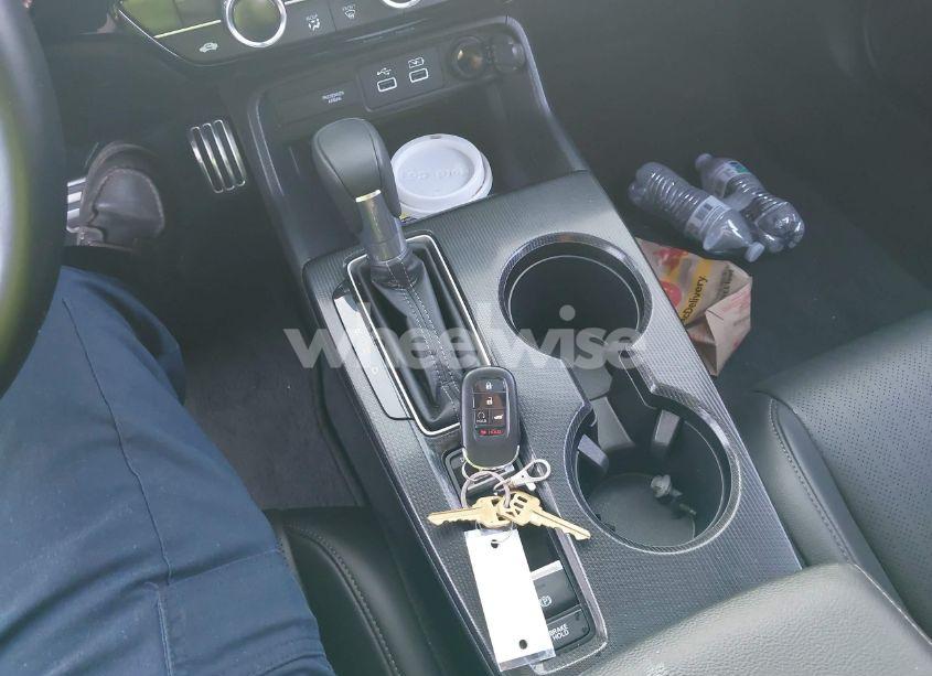 Photo 11 of 2024 Honda Civic SPORT TOURING (VIN 19XFL1H87RE013415)