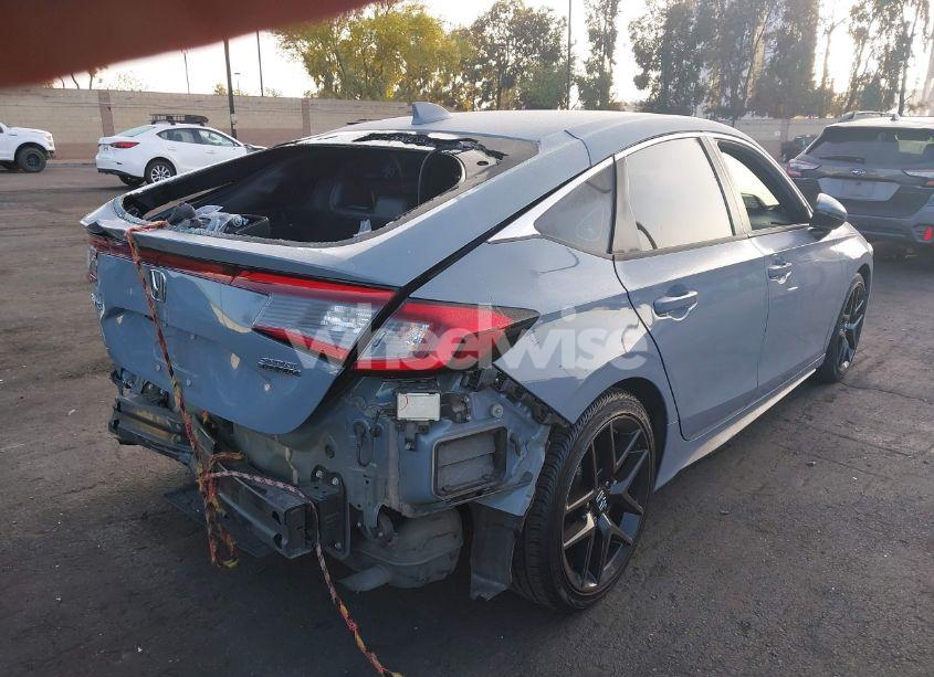 Photo 4 of 2024 Honda Civic SPORT TOURING (VIN 19XFL1H87RE013415)