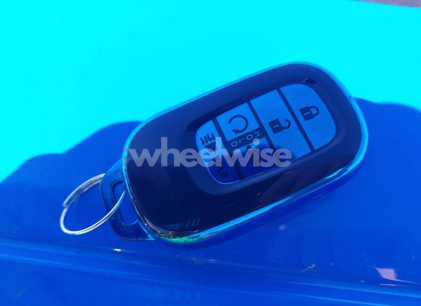 Photo 11 of 2024 Honda Civic SPORT TOURING (VIN 19XFL1H87RE028609)