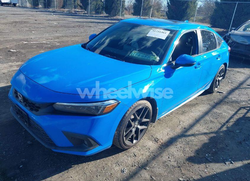 Photo 2 of 2024 Honda Civic SPORT TOURING (VIN 19XFL1H87RE028609)