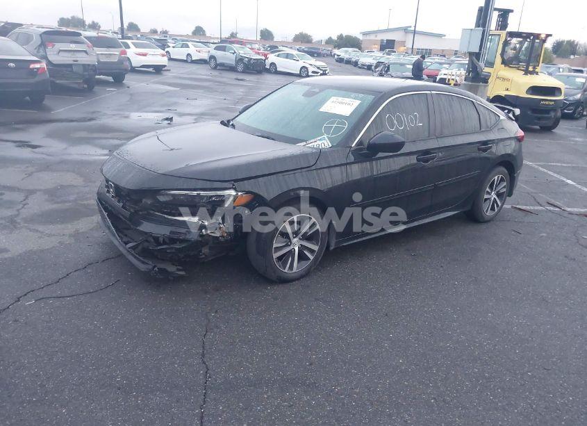 Photo 2 of 2022 Honda Civic LX (VIN 19XFL2H54NE022420)