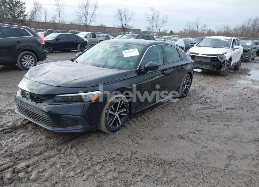 Photo 2 of 2023 Honda Civic LX (VIN 19XFL2H55PE013339)