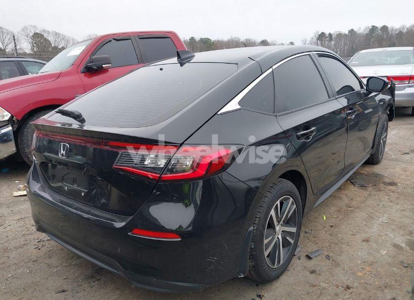 Photo 4 of 2024 Honda Civic LX (VIN 19XFL2H55RE002747)