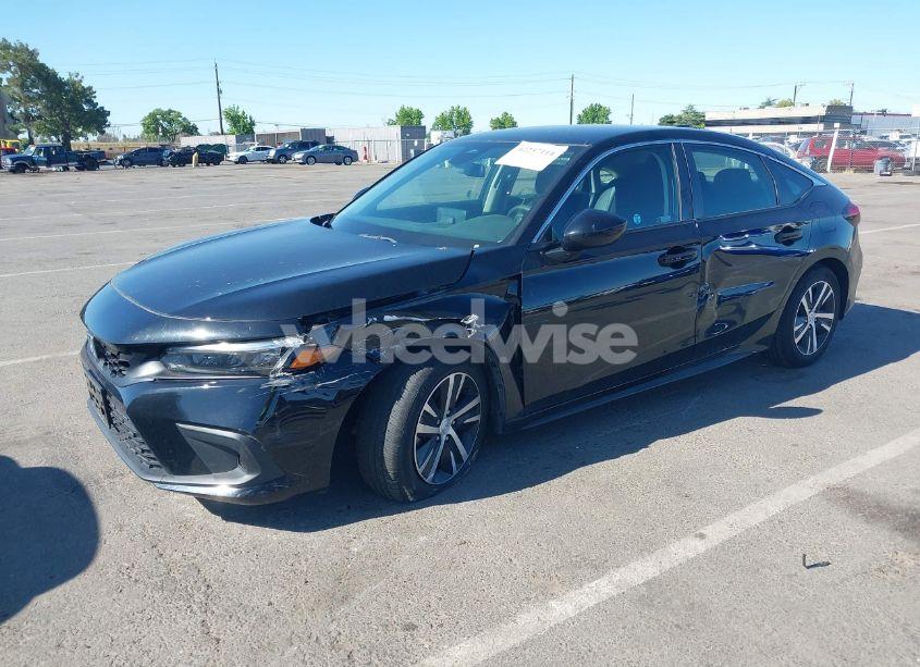 Photo 2 of 2022 Honda Civic LX (VIN 19XFL2H56NE023472)