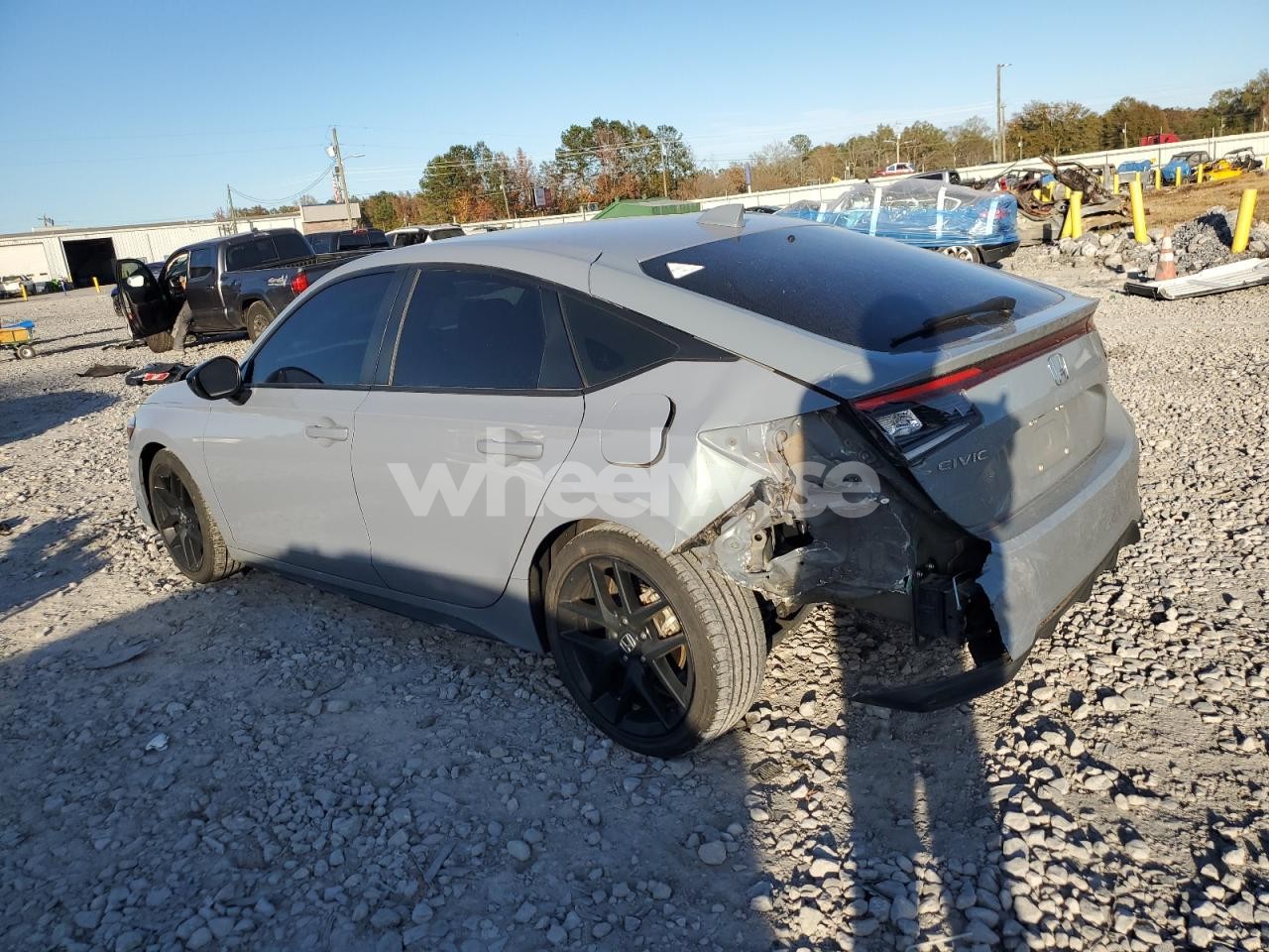 Photo 2 of 2023 HONDA CIVIC SPORT (VIN 19XFL2H86PE022593)