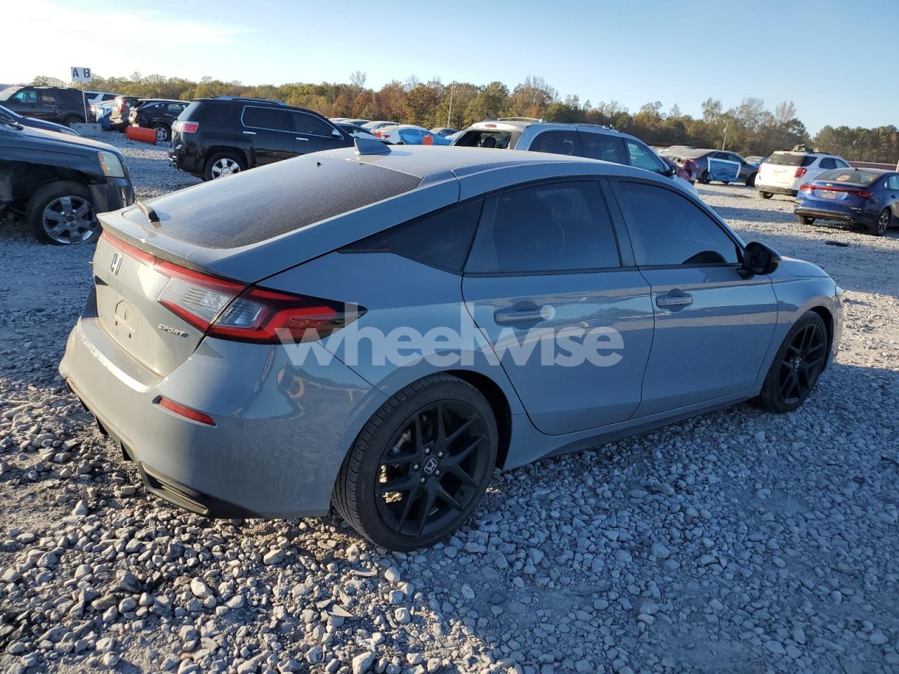 Photo 3 of 2023 HONDA CIVIC SPORT (VIN 19XFL2H86PE022593)