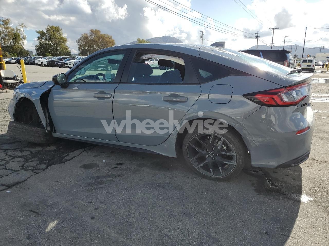 Photo 2 of 2026 HONDA CIVIC SPORT (VIN 19XFL2H88TE006521)