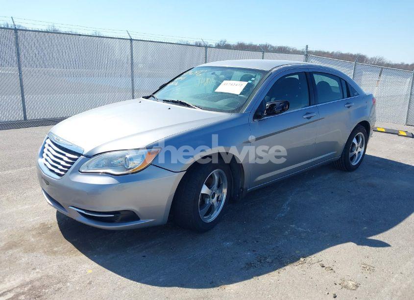Photo 2 of 2013 Chrysler 200 LX (VIN 1C3CCBAB0DN641940)